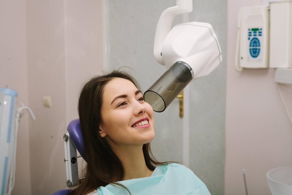 woman getting dental xray in dental chair