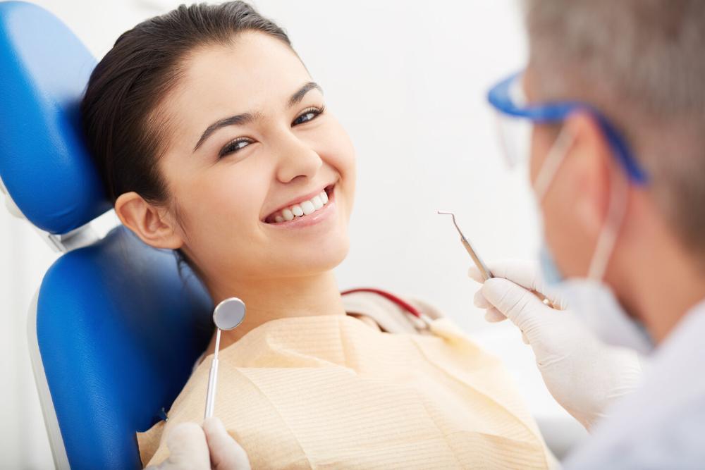 woman smiling in dental chair