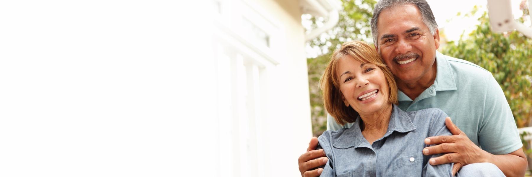 Older man and woman smiling